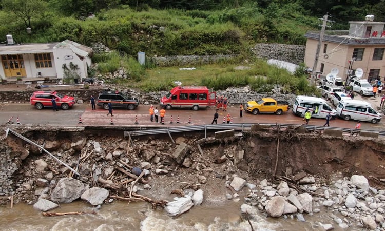 Heavy Rains Kill 4, Leave 8 Missing in Northern China Landslide