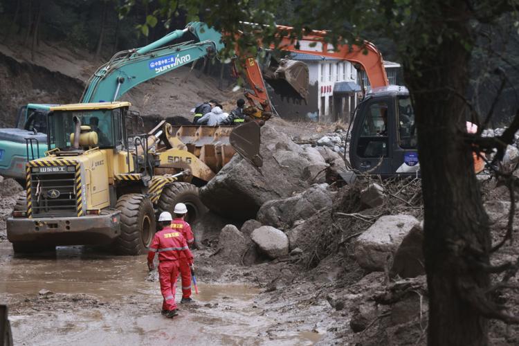 Ten confirmed dead, 33 others missing in China flash floods